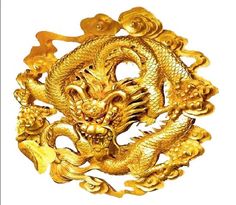 a gold dragon brooch with flowers on it