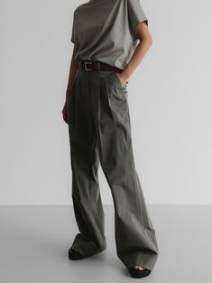 Chic, classic trendy cotton pants with wide leg and two pin tucks. Extra wide leg creates a chic silhouette and comfortable fit. Model is in MINUSEY S. ✔️ Free worldwide express shipping over $100✔️ Loved by 6,500+ customers✔️ Limited edition collections, maximum style⠀⠀⠀⠀⠀⠀⠀⠀⠀Stay ahead of the trend with can’t-find-anywhere-else staples. Your closet will thank you 💕 * MINUSEY S = EU 34, US 2* MINUSEY M = EU 36, US 4* 100% Cotton* Dry clean* Made in Korea - Model Height: 172cm/5'7" (US2, EU34) Classic Baggy Full Length Wide Leg Pants, Chic Wide Leg Cotton Pants For Work, Elegant Wide Leg Cotton Pants, Chic Cotton High Waist Wide Leg Pants, Chic Cotton High-waisted Wide Leg Pants, Chic High-waisted Cotton Wide Leg Pants, Classic Cotton Wide Leg Pants, Solid Cotton Wide Leg Pants For Work, Solid Color Wide Leg Cotton Pants For Work