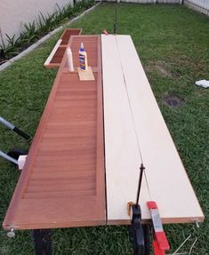 a piece of wood sitting on top of a wooden table