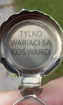 a close up of a person's hand holding a bottle opener with the words tylko variaci sa cos warci on it