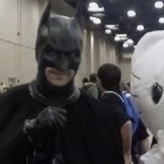 two people dressed up as batman and catwoman