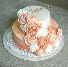 there is a wedding cake with flowers on the top and words that read, oaken way