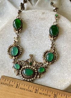 "Stunning Circa 1800s Victorian Austro Hungarian Green Chrysoprase Pearl Silver Gilt Royal Crown Antique Necklace Measures aprox 16 1/2\" Around Weighs 45.8 grams See pictures next to ruler fro scale has been tested and tests silver Although this is Hungarian pice it has a very unique Italian peruzzi feel" Victorian Green Jeweled Jewelry, Victorian Green Jewelry With Jewels, Green Victorian Necklace For Wedding, Victorian Oval Green Necklace, Antique Green Jeweled Necklace, Antique Green Jeweled Necklaces, Ornate Green Oval Necklaces, Ornate Green Necklace With Intricate Design, Vintage Green Emerald Necklace For Formal Occasions