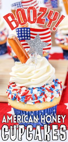 an american honey cupcake with white frosting and sprinkles on top