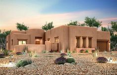 an adobe - style house with cactus and cacti in the front yard at dusk