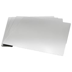 four sheets of white paper stacked on top of each other