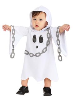 a baby dressed in a ghost costume with chains around his neck and hands on the chest