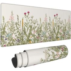 an image of a flowered wallpaper with flowers and plants on the back side