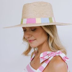 The Berta Palm hat features a cotton band with pastel stripes and is a part of our sustainable, fair trade hat collection and graded at the highest UPF rating. Due to the complexity of a hat made by hand, each hat slightly varies within a size. Help us hand select the right hat for you and include your head size in the order notes upon checkout. Details: Permanent woven band attached to crown of hat Hat Brim measures 3 3/4" wide Crown of hat measures 4 1/2" tall Hat Tip, Sarong Dress, Raffia Hat, Hat Holder, Pastel Stripes, Hat Collection, Easy Travel, Dress Hats, Dress Cover