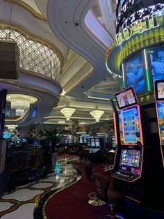 a casino room filled with lots of slot machines