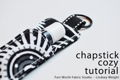 a black and white keychain with a zebra print pattern on it that says, chapstick cozy tutorial