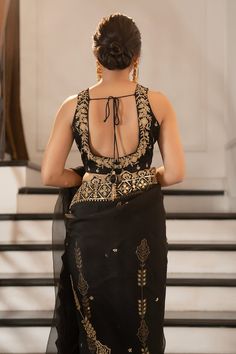 Black saree with mirror and aari embroidered border, buttis and placement embroidery along the pleats. Paired with a padded embroidered blouse and petticoat. - Aza Fashions Mirror Saree, Placement Embroidery, Embroidered Border, Black Saree, Blouse For Women, Silk Organza, Embroidered Blouse, Petticoat, Aza Fashion