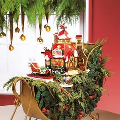 a table with christmas decorations and ornaments on it