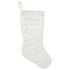 a white christmas stocking hanging from the side on a white background with small dots