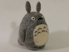 a stuffed animal with big ears and eyes