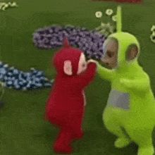 two cartoon characters are standing in the grass and one is pointing at another character's head