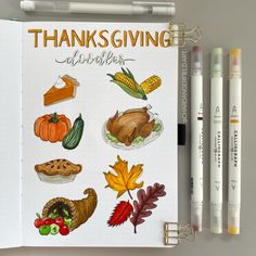 an open notebook with thanksgiving stickers on it