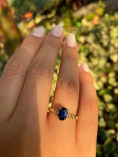 "Oval Cut 7x5 Sapphire Ring, Blue Sapphire Solitaire Ring, Chain Shaped Band, September Birthstone Ring, Gemstone Ring, Anniversary Gift for her Product Details ✿Made to Order ✿Gold Color : Available in Yellow Gold, White Gold, Rose Gold ✿Gold Kt : 14K ( also available in 18k) ✿Gemstone : Blue Sapphire ✿Size of Sapphire : 7 x 5 ✿Sapphire Ct : 1 ct ✿Setting Type : Prong Setting ✿Band Width: 2.40 mm ✿Band Height: 1.40 mm ---- PRODUCTION TIME ---- This ring will be made for you and ready to be ship September Birthstone Ring, Ring Blue Sapphire, Sapphire Solitaire Ring, September Birthstone Rings, Sapphire Solitaire, Ring Chain, Ring Blue, September Birthstone, Blue Sapphire Rings