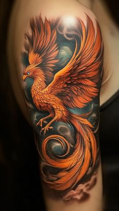 a woman's arm with an orange and black bird on it