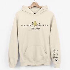 Experience the warmth of motherhood not just in spirit but in style with the Motherhood is the Greatest Thing Family Personalized Custom Unisex Sweatshirt and Hoodie. This cozy garment is more than just a piece of clothing; it's a celebration of the journey of motherhood, lovingly crafted to make every mom feel cherished. Specifications: Material: Typically, such sweatshirts are made from a blend of cotton and polyester, providing both comfort and durability. Fit and Sizes: Generally available i World Music Day, Comfy Blouse, Yoga Hoodie, Music Hoodies, Cat Hoodie, Super Dad, Personalized Hoodies, Custom Hoodies, Hoodie Girl