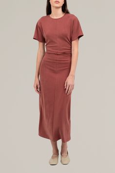 elevate your wardrobe with this versatile side shirred midi dress, perfect for transitioning from day to night. designed with a flattering shirred detail along the waist, this dress effortlessly accentuates your figure while maintaining a relaxed, comfortable fit. the soft, muted rust tone adds a modern touch to a classic silhouette, ideal for both casual outings and special occasions.

the midi length provides a timeless, sophisticated look, while short sleeves ensure ease of movement. layer under your favorite fall jacket and pair it with flats or ankle boots for a chic fall ensemble. Cloth Shop, Tie Front Blouse, Strapless Maxi Dress, Fall Street Style, Fall Jackets, Knitted Tank Top, Knit Tanks