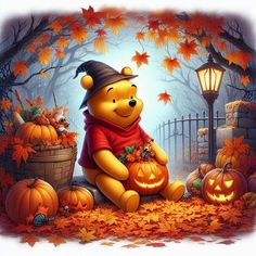 a winnie the pooh sitting on top of pumpkins