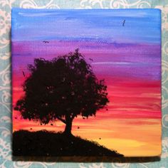 an acrylic painting of a tree at sunset