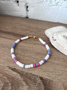 These anklets are made with natural seashell beads & Gold plated spacer beads White Anklets With Colorful Beads For Beach, White Round Beads Anklets For Vacation, Handmade White Beachy Anklets, White Beaded Strand Anklet, Beaded Anklet, Beaded Anklets, Shell Jewelry, Shell Beads, Jump Rings