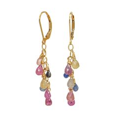 A mix of colorful sapphires dangle from these drop earrings. Gold fill Sapphires 1-3/4" length with lever backs Multicolor Drop Earrings, Multicolor Drop Jewelry With Matching Earrings, Multicolor Dangle Jewelry With Lobster Clasp, Multicolor Multi-stone Teardrop Earrings, Multicolor Long Drop Gemstone Earrings, Multicolor Gemstone Long Drop Earrings, Multicolor Multi-stone Dangle Earrings, Multicolor Dangle Earrings With Lever Back Ear Wires, Drop Earrings Gold