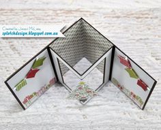 an origami box with two pieces cut out to look like it is open