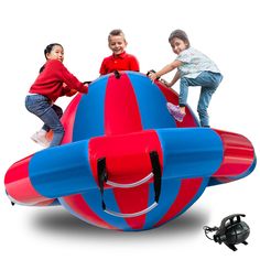 two children are playing on an inflatable toy airplane with their arms around each other