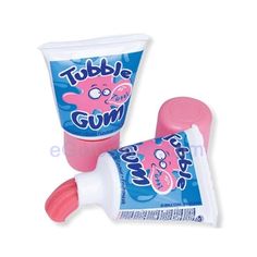 two tube gums with toothpaste on the top and one tube filled with gum