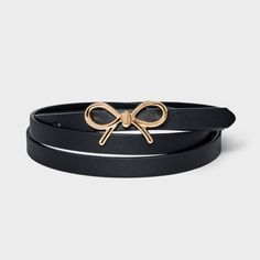 Add a sweet touch of style to any of your looks with this Bow Belt Belt from Ava & Viv™. This black belt with a slim profile features a bow-shaped metal buckle in a gold tone for a charming aesthetic. The adjustable strap offers a secure, customized fit around your waist, and it pairs well with both casual and dressy outfits. Charming Aesthetic, Womens Leather Belt, Bow Belt, Reversible Belt, Belt Shop, Dressy Outfits, Metal Buckles, Black Belt, Belt Buckles