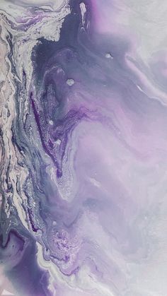 an abstract painting with purple and white colors on the bottom, as if it were fluid paint