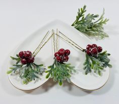 "These beautiful little hairpins are the perfect accessory this Christmas, just slide them into a pretty updo to add a little frosty Christmas charm! These pins are simply made-up of Dusty Dusty Miller leaves and lovely sparkly red Holly berries. They are available in sets of 3, 5, or 8 and your choice of nickel, gold, brown, or black finish hairpins.  The purchase of this listing is for a set of either 3, 5, or 8 Dusty Miller and Holly Berry hairpins with the following specifications: Details: Holiday Winter Hair Jewelry, Christmas Bridal Hairpiece, Holly Hair Piece, Red Wedding Hair Clip, Red Bridal Hair, Poinsettia Hair Clip, Winter Wedding Hair, Bridesmaid Hair Makeup, Dusty Miller