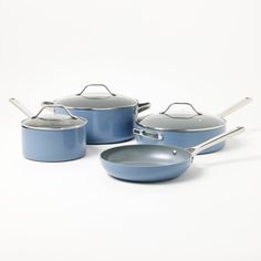 blue pots and pans on a white background