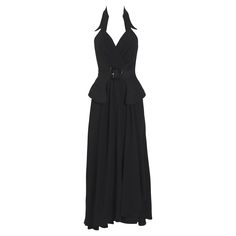 Introducing a vintage spectacular Thierry Mugler couture long skirt or dress with an attached black belted halter top. Crafted with the utmost attention to detail, this exquisite piece features a long flowing skirt that folds and drapes beautifully, creating an elegant silhouette that will flatter any body type. The attached halter top is designed to showcase your shoulders and back, with a signature black belt cinching your waist for a figure-hugging effect. Made from premium quality materials, this vintage Thierry Mugler creation is a testament to the designer's visionary approach to fashion. A versatile piece that can be worn for a variety of occasions, from formal events to casual outings. This vintage Thierry Mugler creation is guaranteed to turn heads and make a lasting impression. D Thierry Mugler 80s, Thierry Mugler Couture, Mugler Couture, Vintage Thierry Mugler, Long Flowing Skirts, Vintage Rock, Thierry Mugler, Flowing Skirt, 80s Vintage