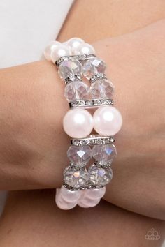 Held together by white rhinestone encrusted silver frames, a stretchy pair of bubbly pink pearl bracelets are infused with white rhinestone encrusted silver rings, iridescent crystal-like beads, and oversized pink pearls for a timeless finish. Sold as one individual bracelet. Pink Pearl Bracelet, White Pearl Bracelet, Accessory Ideas, White Bracelet, Pearl Bracelets, Iridescent Crystal, Wedding Accessory, White Bracelets, Red Bracelets