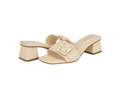 Calvin Klein Ariella - Women's Shoes : Ivory : Breathable and comfortable, the Calvin Klein Ariella sandals are the perfect choice to style up your different outfits. The polyurethane upper features an adjustable buckle closure that ensures a perfect. These stylish sandals come with foam insole and polyurethane lining that makes them comfortable to wear all day. A great addition to your footwear collection, these heeled sandals work for different occasions. Slip-on style. Open, square toe design. Block heels. Synthetic rubber outsole. Imported. Measurements: Heel Height: 1 10 13 in Product measurements were taken using size 7, width M. Please note that measurements may vary by size. Stylish Sandals, Footwear Collection, Synthetic Rubber, Calvin Klein Woman, Different Outfits, Toe Designs, Heeled Sandals, Womens Calvin Klein, Product Reviews