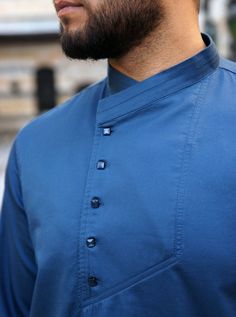 Cross-over mandarin collar Asymmetrical buttoned opening Model is 184cm (6 feet) and wearing size L Item Code: mQ0982 Traditional Stand Collar Top With Buttons, Blue Casual Kurta For Eid, Casual Blue Kurta For Eid, Long Sleeve Blue Tops For Eid, Blue Cotton Nehru Jacket With Long Sleeves, Blue Formal Nehru Jacket With Stand Collar, Formal Blue Nehru Jacket With Stand Collar, Blue Long Sleeve Bandhgala For Spring, Casual Kurta For Workwear And Eid