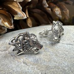 TAKE AN ADDITIONAL 20% OFF THE ALREADY REDUCED SALE PRICE - ADDITIONAL 20% IS DEDUCTED AT CHECKOUT with code SAVE20 These detailed Celtic Wolf post earrings will catch the eye. A beautiful design with a wolf and a Celtic trinity knot design. Solid sterling silver. The detail of the wolf's head is incredible - you can see each detail of fur on his body! - a beautiful work of art! Pure sterling silver. 1/2" x 1/2" solid sterling silver stud earrings. Symbolism of the Wolf Wolf is a symbol of guard Wolf Earrings, Celtic Wolf, Viking Wolf, Norse Jewelry, Celtic Trinity Knot, Wolf Jewelry, Pagan Jewelry, Trinity Knot, Knot Design