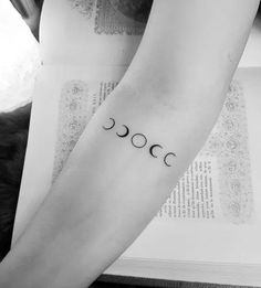 a person with a tattoo on their arm that reads,'oooh '