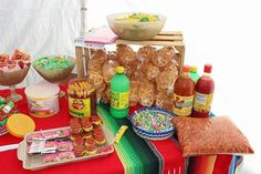 an assortment of food and condiments on a table