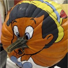 a pumpkin with an image of a cartoon character on it