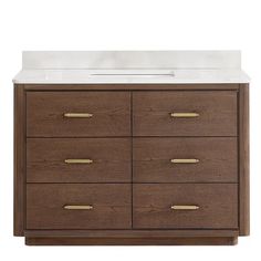 an image of a bathroom vanity with white counter top and wooden drawers on the side