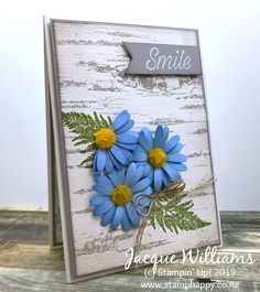 a card with some blue flowers on it