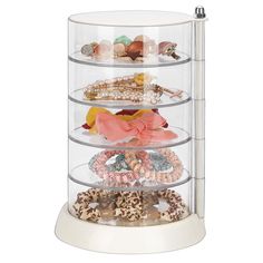 a display case with several different types of bracelets and rings on the bottom shelf