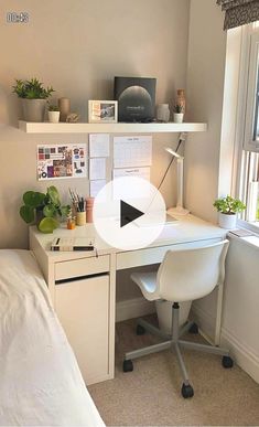 a bedroom with a bed, desk and shelves on the wall next to a window