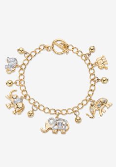 Featuring a sparkling crystal-encrusted elephants and golden bead accents, this charm bracelet is a smart and stylish way to show your love of the majestic animal. Includes gift box and drawstring pouch. Gold ToneToggle ClosureMain Stone: 1 Round Faceted Cut Crystal, 5 mm x 5 mmDimensions: 18 mm wide x 7.5 inches long x 5 mm highIncludes gift box and drawstring pouchImported | Women's Gold Tone Round Crystal Elephant Charm Bracelet by PalmBeach Jewelry in Crystal Crystal Elephant, Elephant Charm Bracelet, Jewelry Bracelets Gold, Spring Vacation, Ankle Chain, Bracelet Crystal, Gold Charm Bracelet, Elephant Charm, Toggle Bracelet