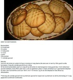 an image of cookies on a plate with the recipe in english and german below it